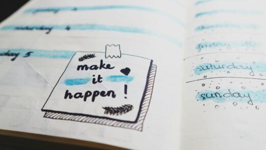 Close-up view of a planner page with motivational text and colorful designs.
